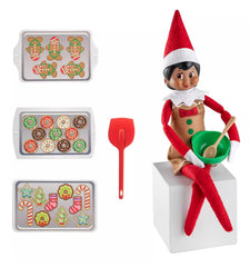 Elf on the Shelf itty-bitty baker apron highlights imaginative play and holiday kitchen pretend.