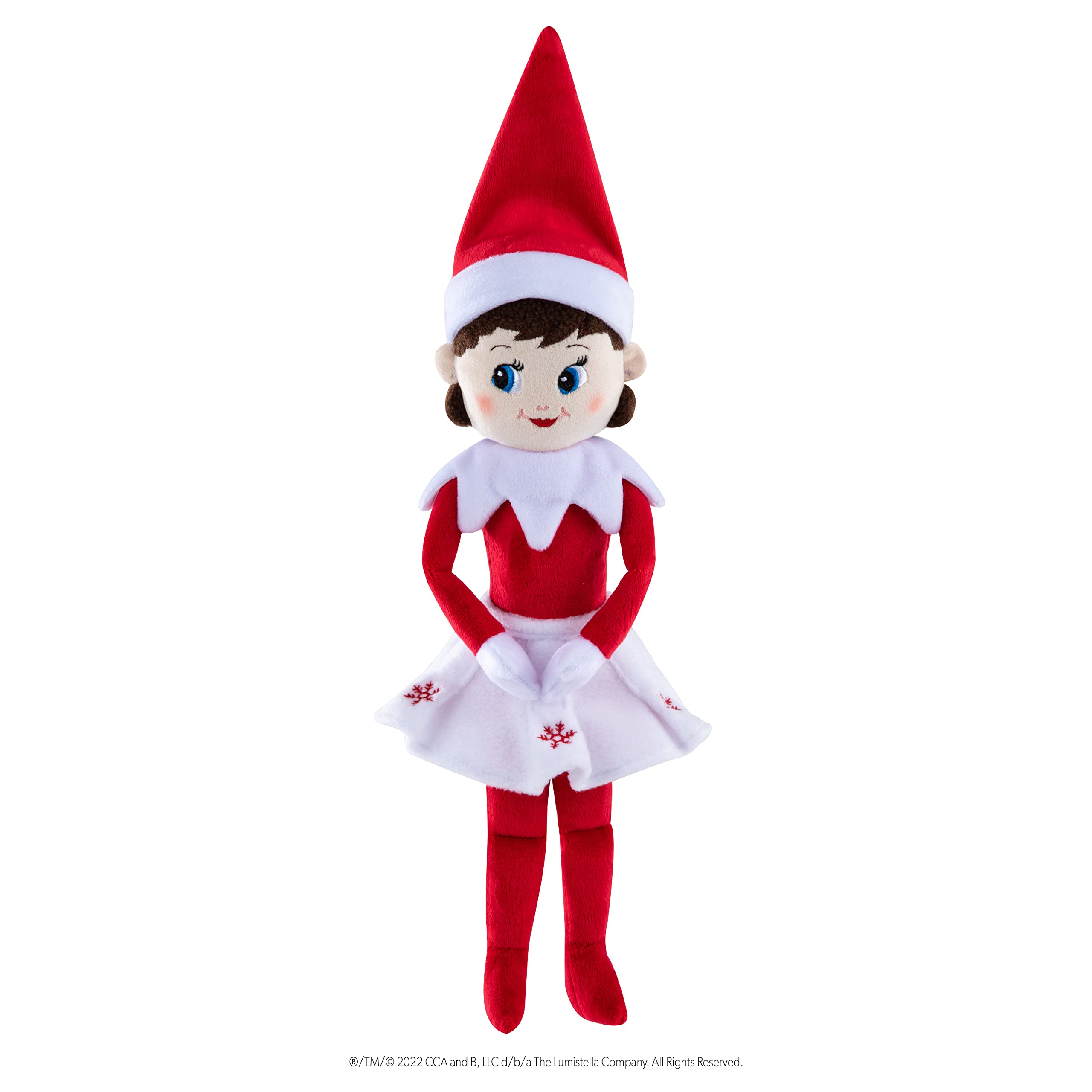 Child holds Elf on the Shelf Plushee Pals for year-round fun.