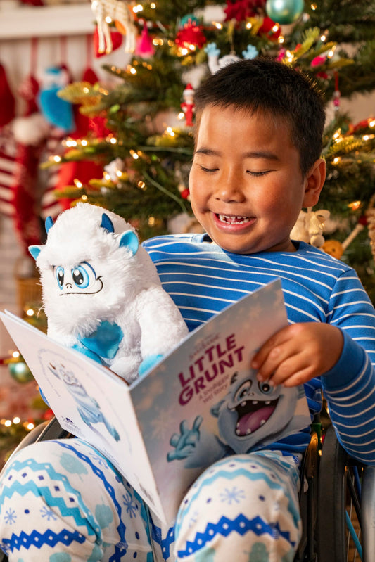 The Elf on the Shelf SnoBiggie Little Grunt storybook companion for cozy bedtime reading.