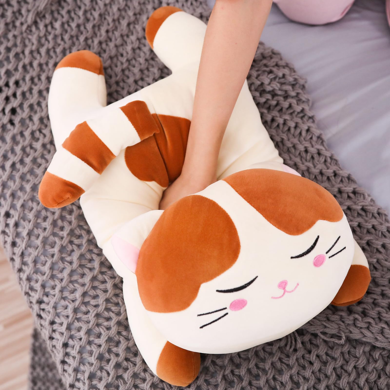 Elfishgo cat plush close-up shows soft fabric for cuddling.