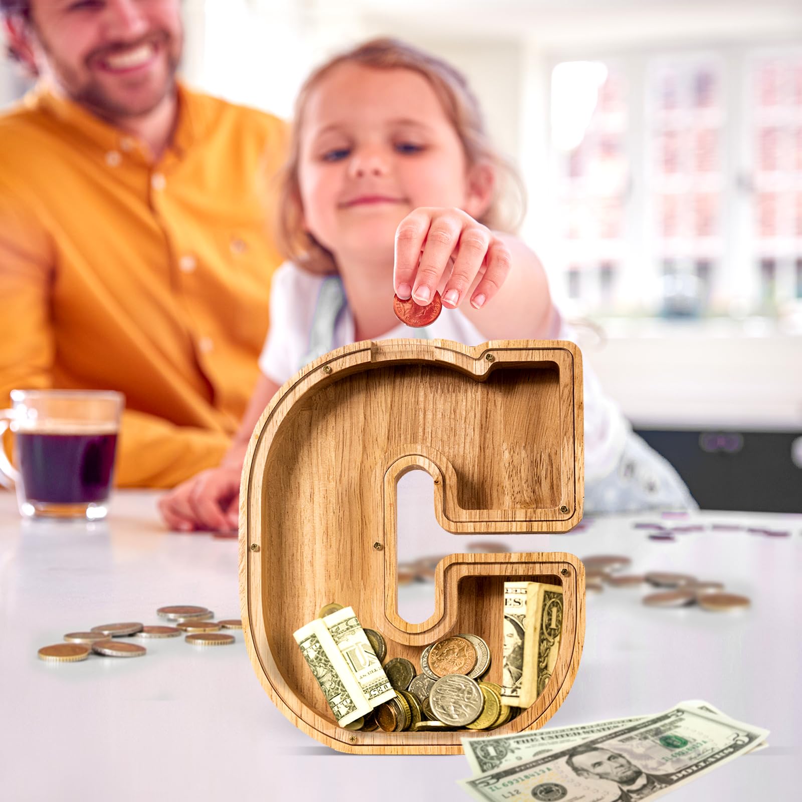 ELX wooden piggy bank featuring an acrylic panel for trackable savings visually