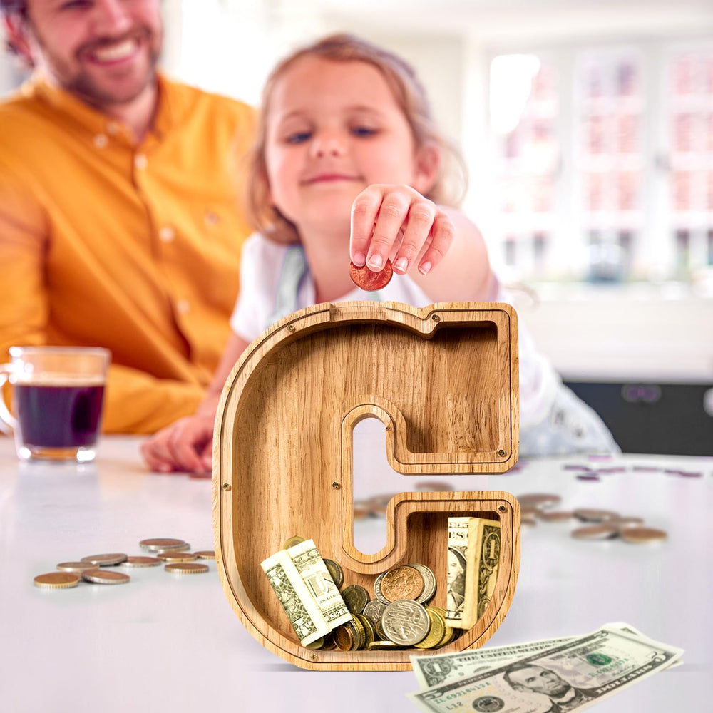 ELX wooden piggy bank featuring an acrylic panel for trackable savings visually