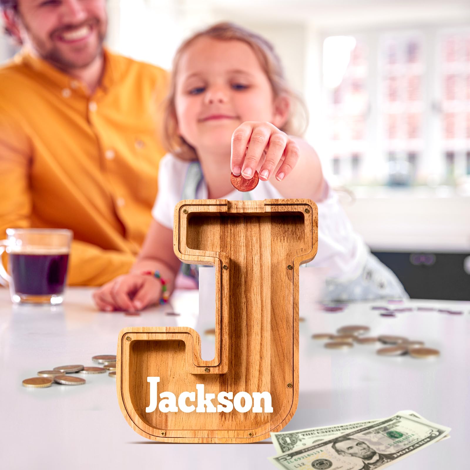 ELX piggy bank with a removable lid for easy coin access