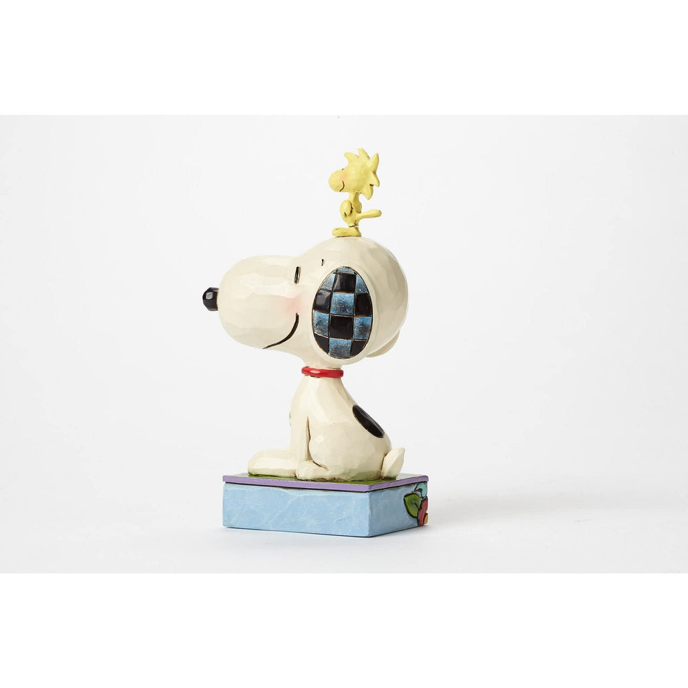 Enesco Jim Shore Peanuts figure, hand-painted stone resin with folk-art detail.