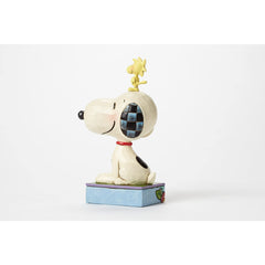 Enesco Jim Shore Peanuts figure, hand-painted stone resin with folk-art detail.