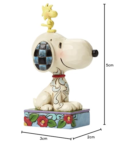 Jim Shore style Enesco figurine with folk-art detailing.