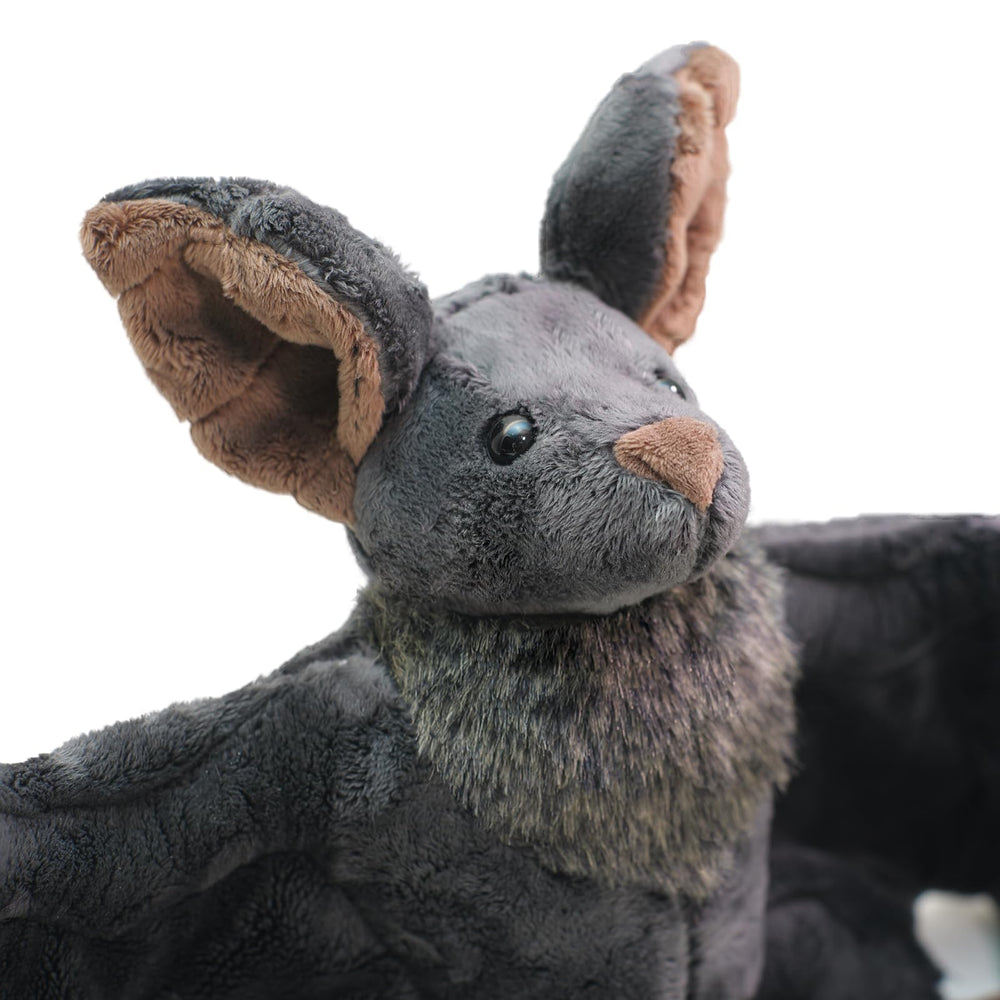 Enivtfz Goth Bat Plush side view, poseable wings for cuddling