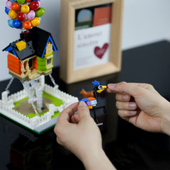 ENJBRICK Up Balloon House kids collaborating to build a tensegrity-inspired sculpture.
