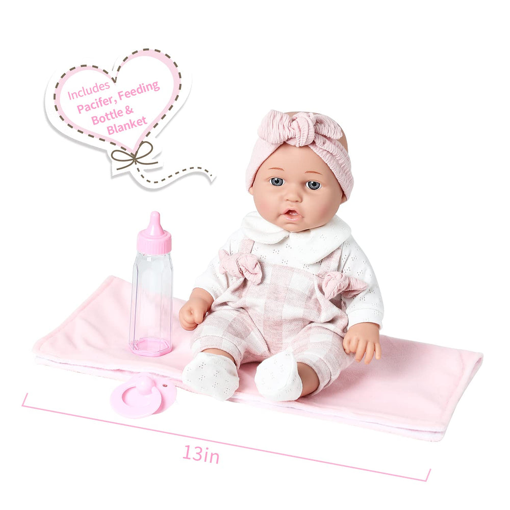 Enjoyin baby doll with soft microfabric blanket for cozy cuddling.