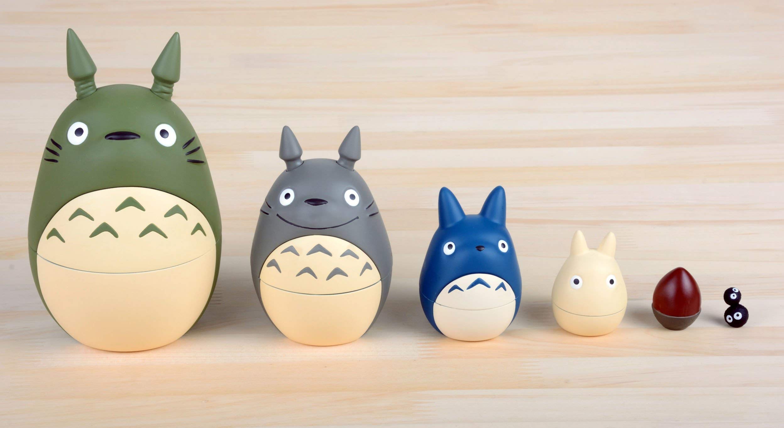 Ensky nesting dolls arranged for decorative shelf display