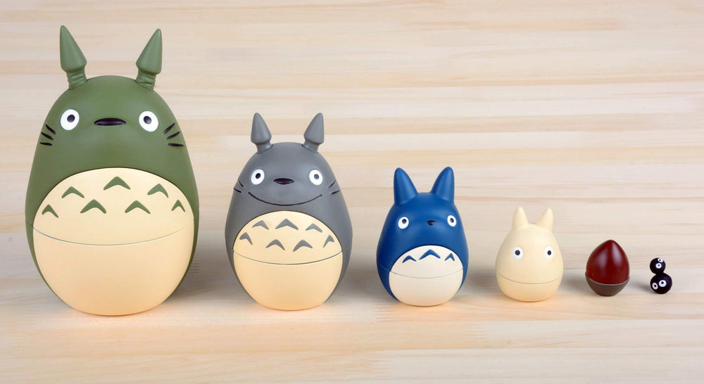 Ensky nesting dolls arranged for decorative shelf display