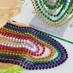Colorful EOBOH beads arranged for festive photos and events