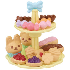 Cookies, cakes, and candies create delightful mini desserts for pretend gatherings.