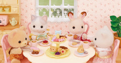 Table and four chairs provide a complete play dining area for Sylvanian figures.