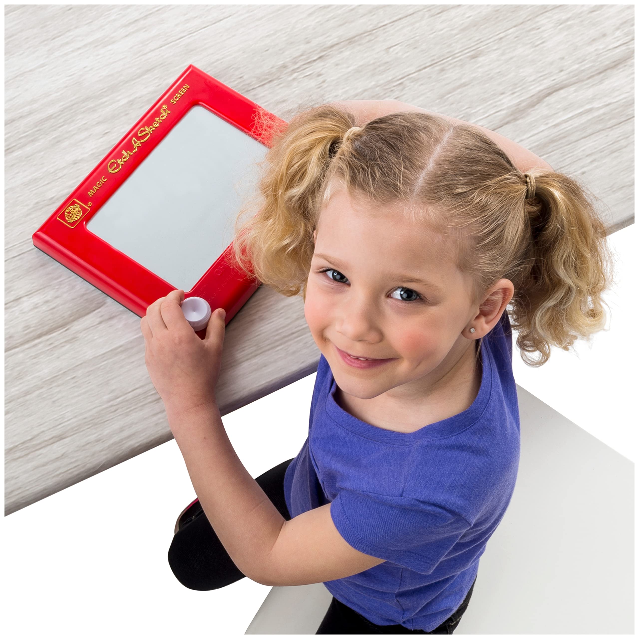 Etch A Sketch Classic portable drawing board ideal for travel and play.