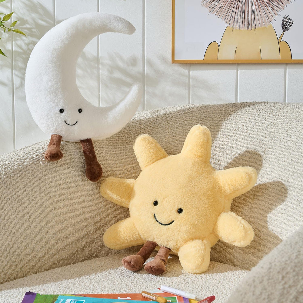 EUEGWYX Sun and Moon plush in a backpack ready for travel