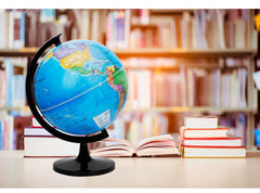 Exerz globe on stylish home decor shelf