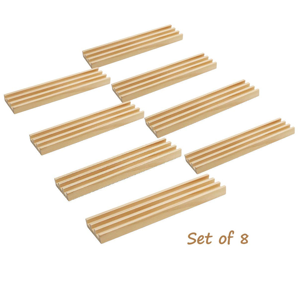 Exqline domino racks close-up shows three-slotted grooves for upright tiles.