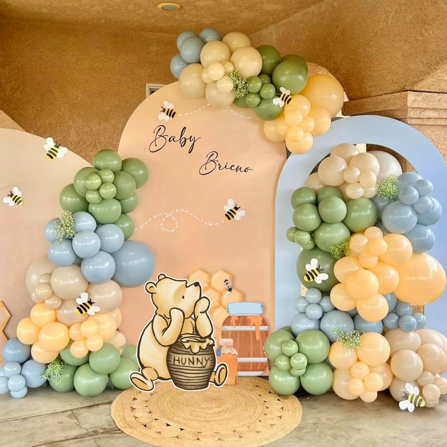 FabTab Winnie arch kit with green balloons for Pooh themed baby shower