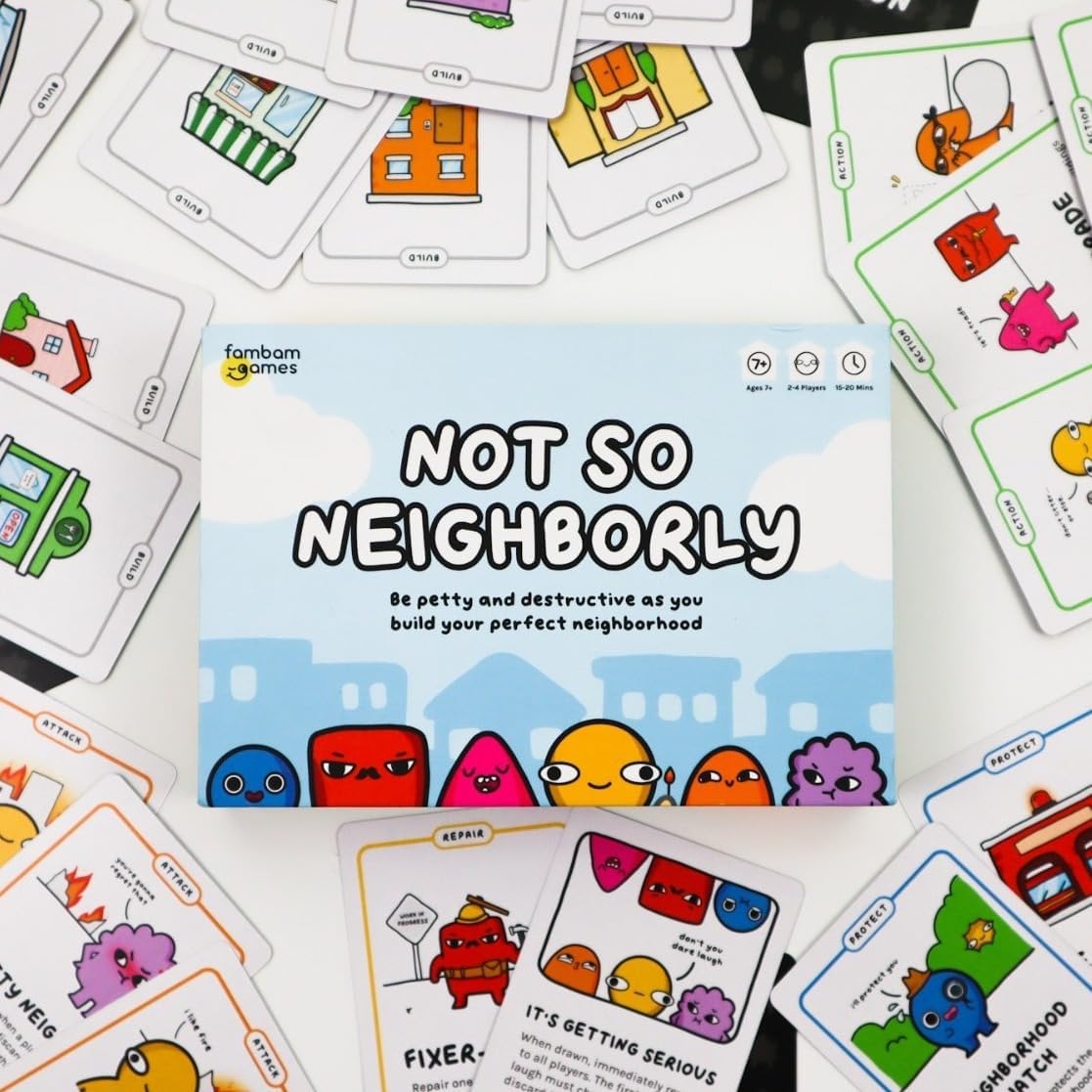 Two to four players around a table playing Not So Neighborly energetically.