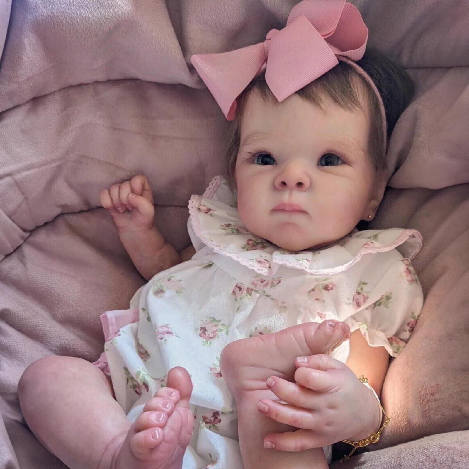FASMAS Reborn doll feeding bottle in use during nurturing play