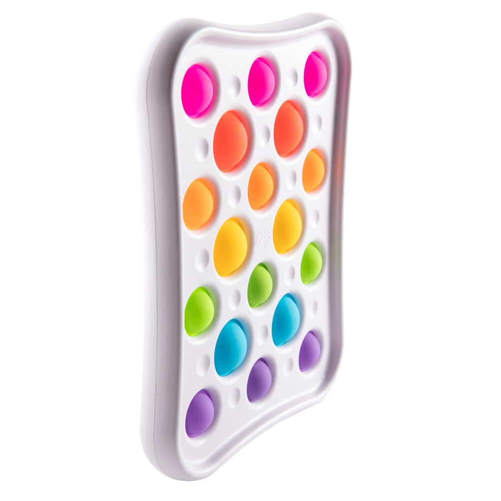 Fat Brain Dimpl Pops colorful bubbles stacked for on-the-go sensory exploration.