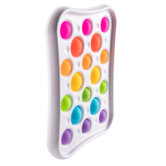 Fat Brain Dimpl Pops colorful bubbles stacked for on-the-go sensory exploration.