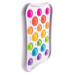 Fat Brain Dimpl Pops colorful bubbles stacked for on-the-go sensory exploration.