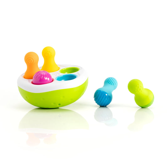Fat Brain Toys SpinnyPins bowl for sorting and sensory exploration.