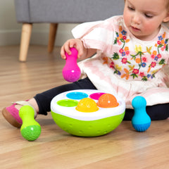 Fat Brain Toys SpinnyPins built-in chimes spark auditory curiosity.