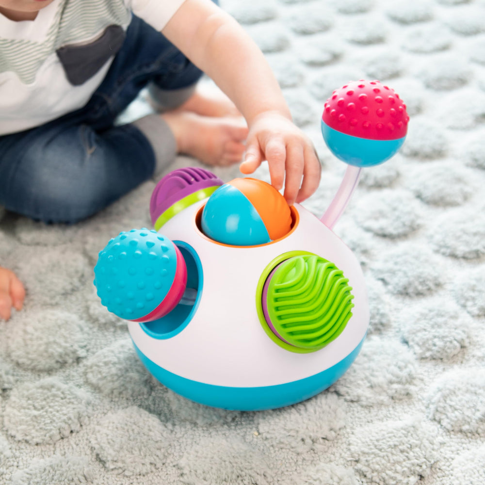 Fat Brain Toys Klickity clicking sounds engage little ears and support auditory curiosity.