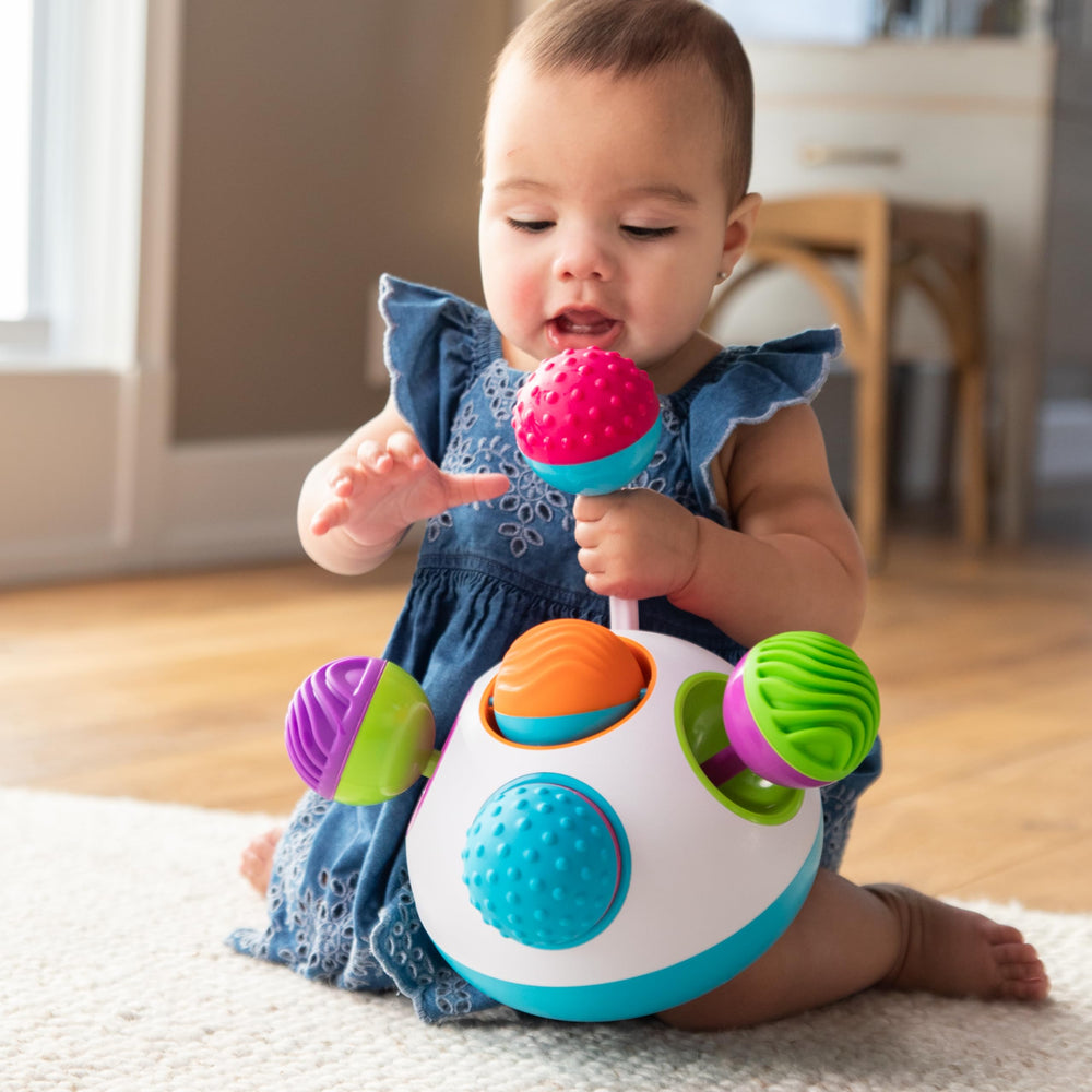 Fat Brain Toys Klickity stable bottom grips keep balls steady during back-and-forth play.