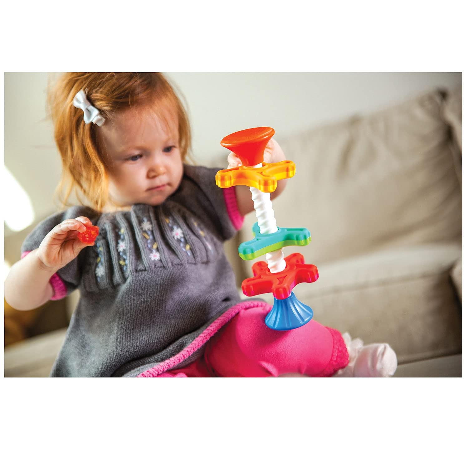 Fat Brain Toys Minispinny propellers spin when flipped, boosting cause-and-effect exploration