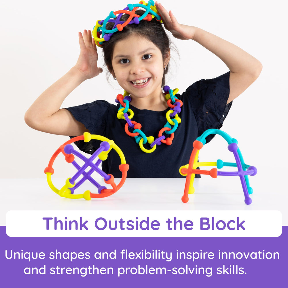 Fat Brain Toys Plip Kit close-up pieces encourage spatial thinking during building sessions.