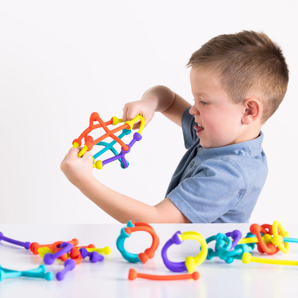 Fat Brain Toys Plip Kit bright colors spark imagination during builds.