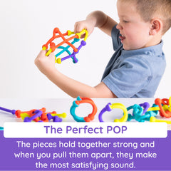 Fat Brain Toys Plip Kit sculpture built from colorful pieces showcases creative play.