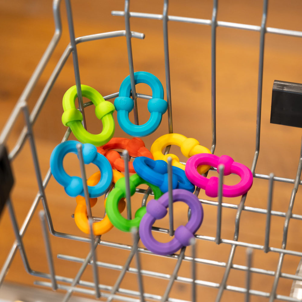 Fat Brain Toys Plip Links easy-clean-silicone for hygiene and reuse.