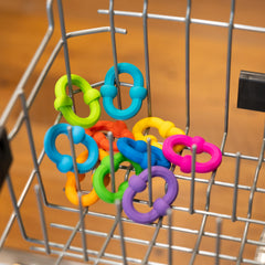 Fat Brain Toys Plip Links easy-clean-silicone for hygiene and reuse.