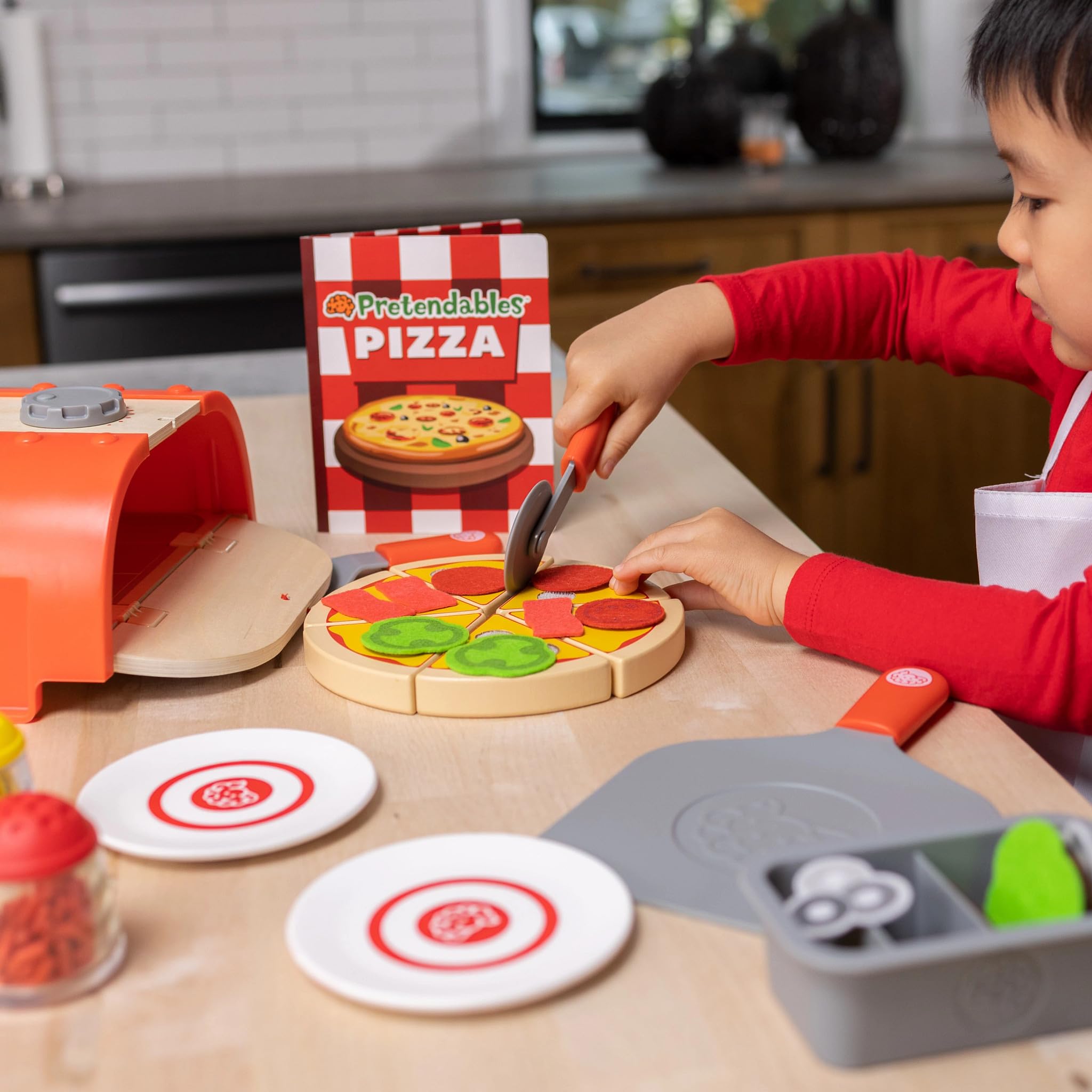 Fat Brain Toys Pretendables Backyard Pizza Oven Set kid friendly utensils and plates for role play