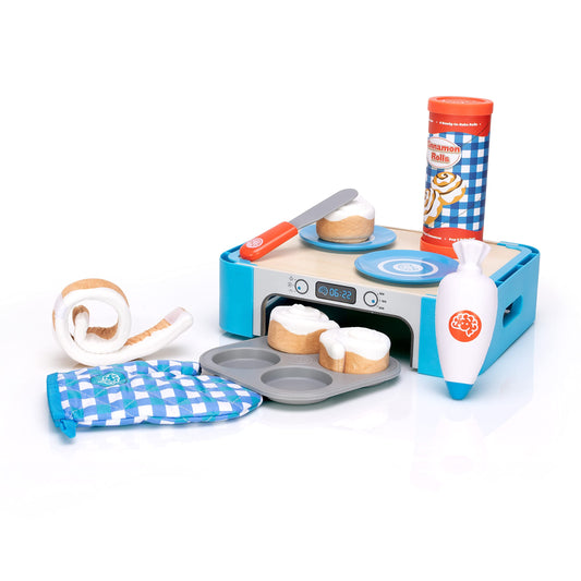 Fat Brain Toys Pretendables Cinnamon Roll Set shown with oven-storage crate for tidy pretend play.