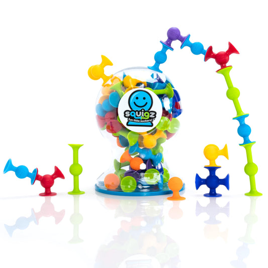 Fat Brain Toys Squigz Deluxe Set on shelf shows color variety for imaginative play.