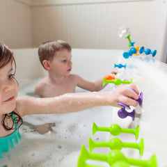Fat Brain Toys Squigz Deluxe assembly in action demonstrates versatile suction construction.