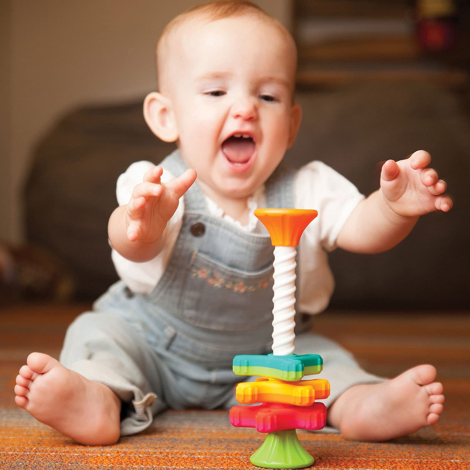 Fat Brain Toys Tobbles base-balance demonstrates gravity-defying stacking for motor development