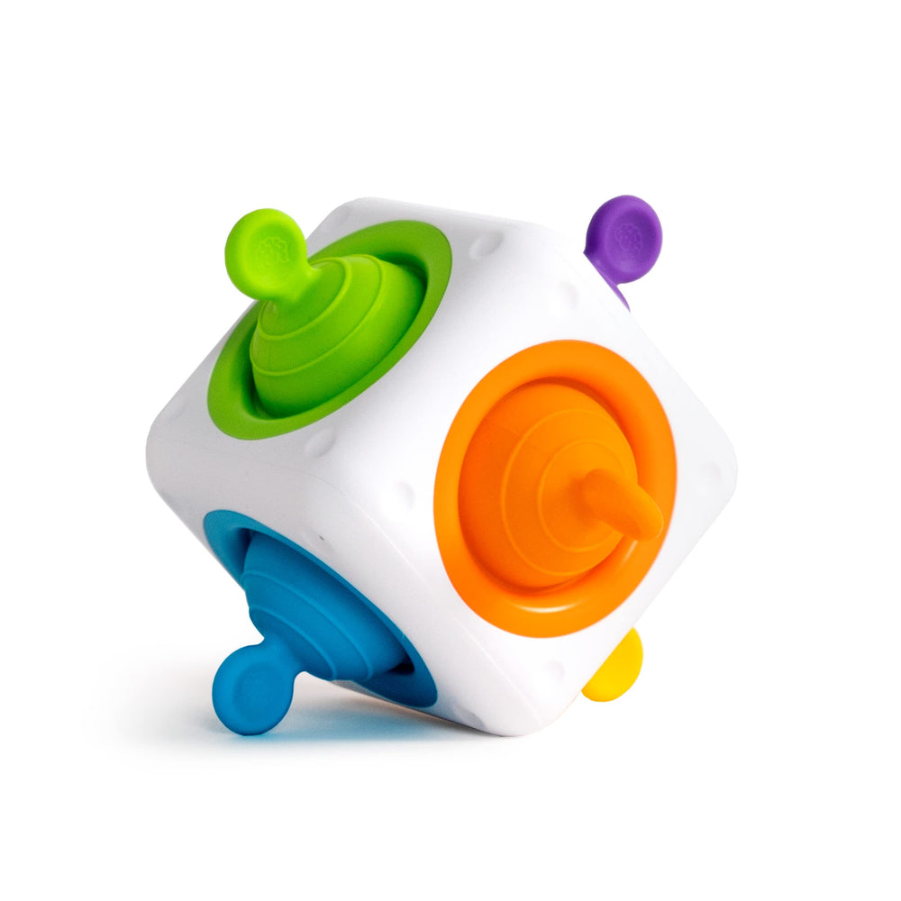 Fat Brain Toys Tugl Cube with silicone bubbles for tactile exploration and calm focus.