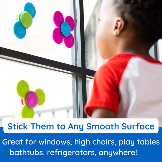 Fat Brain Toys Whirly Squigz suction toys attach securely for travel.
