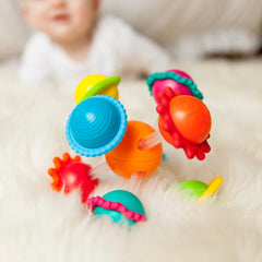 Wimzle four bars sliding through the center ball for hands-on exploration