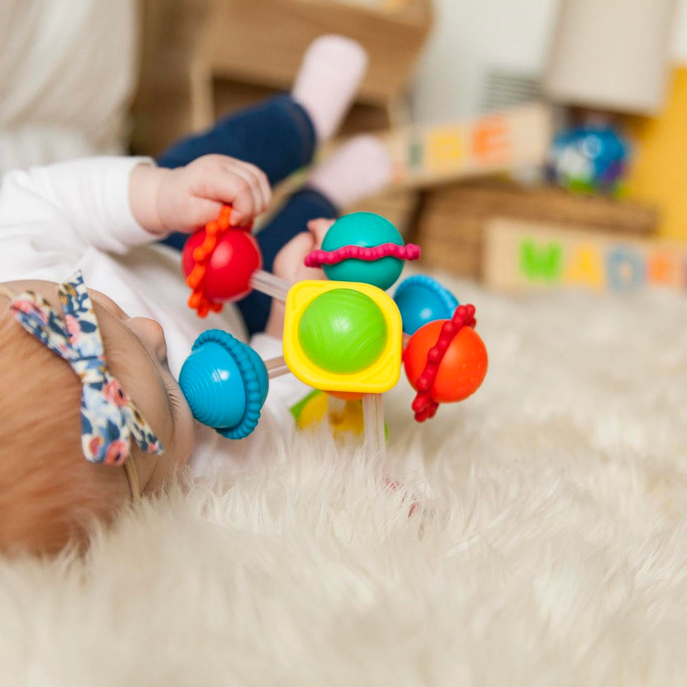 Spheres on Wimzle ends with silicone rings for textured grip