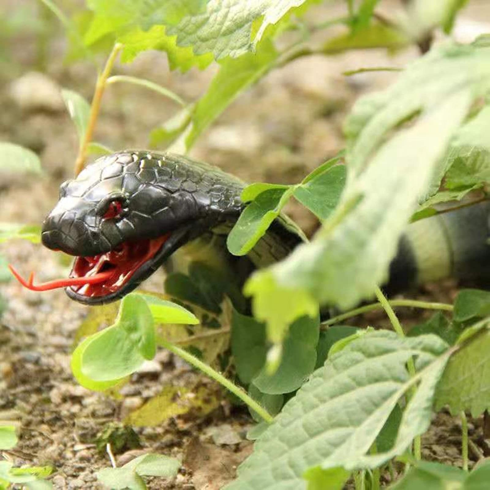 FauKait robot snake with swinging tail moves smoothly across floors.