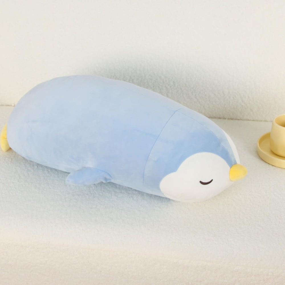 FFxiong 22-inch penguin plush as a body pillow for relaxed lounging