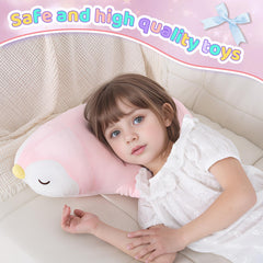 FFxiong pink penguin plush serves as a comfy bedtime reading companion.